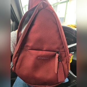 Sherpani Burgundy Sling Backpack